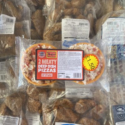 2X small meaty deep dish pizzas (frozen food section)